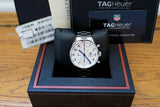 Swiss luxury chronograph wristwatch with white dial and blue markers in original box