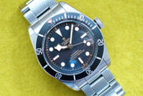 Stainless steel 41mm automatic Swiss dive watch with black bezel and round hour markers