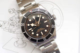 Stainless steel 41mm luxury Swiss automatic watch with black bezel and dial on metal bracelet