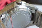 Close-up of Tudor Pelagos titanium watch case back with engraved details