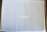 Tudor watch box covered with protective white tissue paper, luxury watch packaging