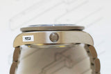Close-up side view of a brushed stainless steel luxury watch case and bezel