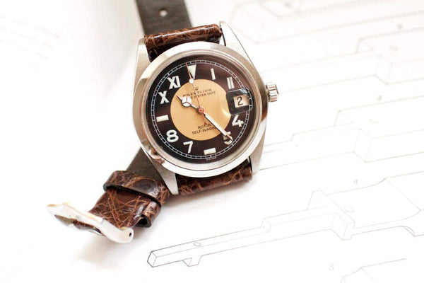 Vintage Tudor Prince Oysterdate California dial watch with brown leather strap and date display
