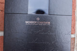 Close-up of a luxury Vacheron Constantin watch presentation box with embossed lettering.