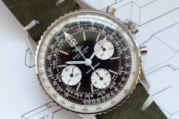 Vintage Breitling Navitimer 806 chronograph watch with black dial and three subdials