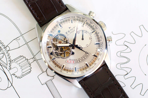 Zenith El Primero chronograph luxury watch with open heart dial and brown leather strap