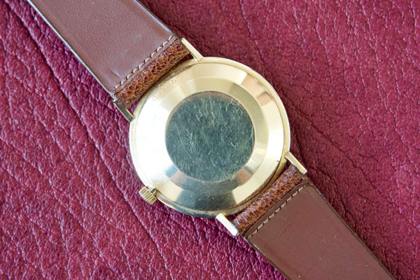SOLDOUT: Tiffany and Co Automatic 33mm Roman Numeral 14k Gold Watch