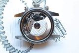 Close-up of a Tudor Prince Swiss automatic watch movement inside a stainless steel case