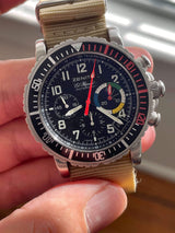 Zenith El Primero automatic luxury watch with black dial and tan fabric strap